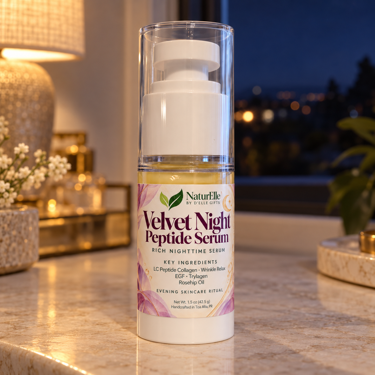 A bottle of Naturlle by Style of Life 'Velvet Night Peptide Serum' standing on a marble countertop with a blurred bedroom background showing a lamp and window.