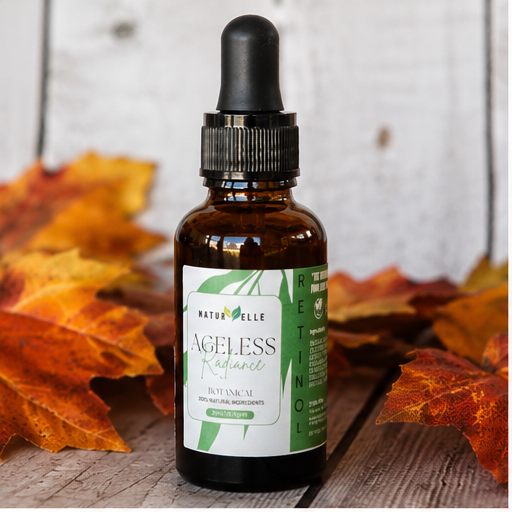 Frasco del producto para el cuidado de la piel 'Ageless' sobre una superficie con hojas de otoño — NaturElle Puerto Rico