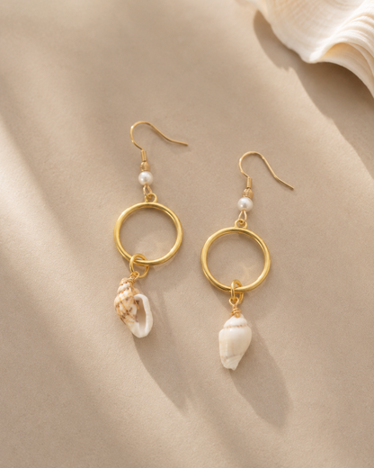 aros de stainless steel con caracoles hechos en puerto rico