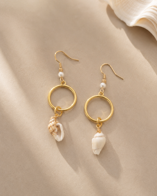 aros de stainless steel con caracoles hechos en puerto rico
