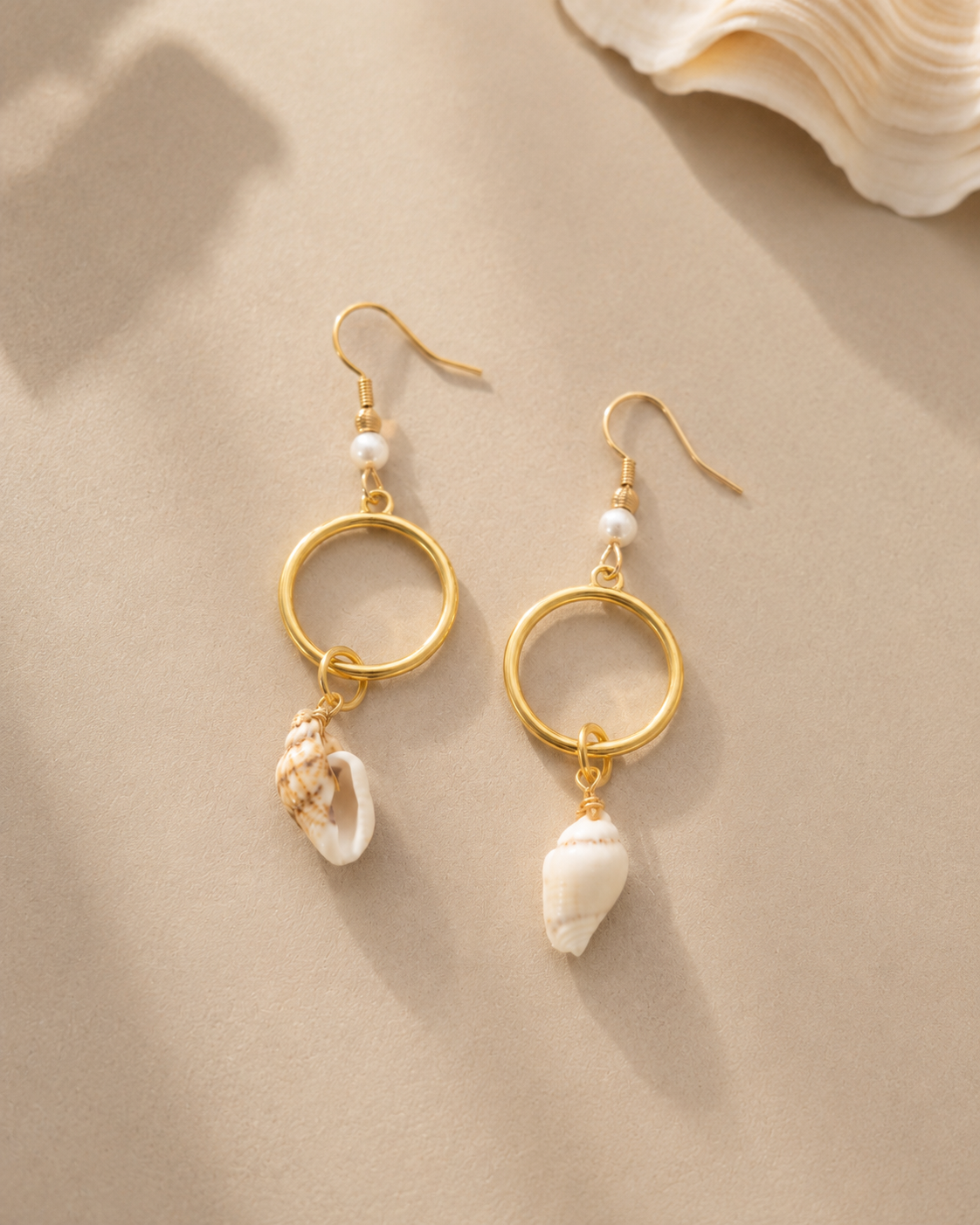 aros en oro con caracoles joyeria artesananal hecha en casa 